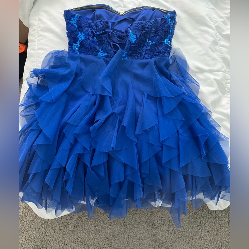 I love the flowers on the dress